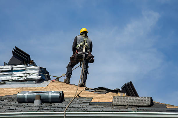 Professional Roof Replacement technician working in Foxboro, MA